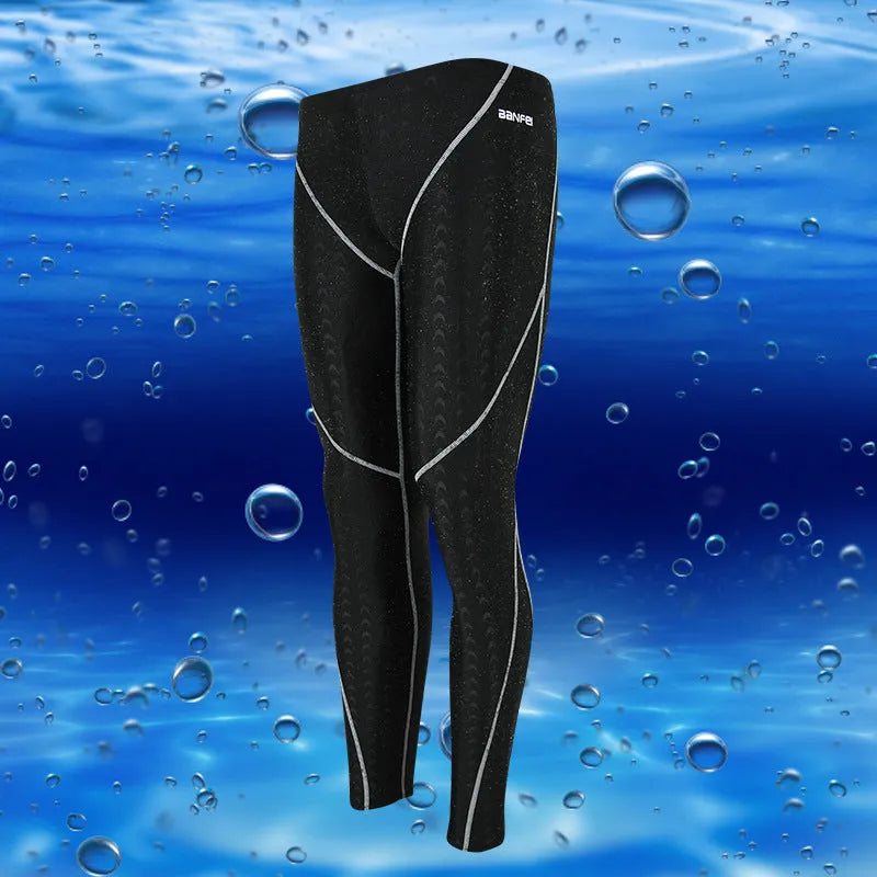 Men's nylon cropped swimming trunks in black with line pattern detail