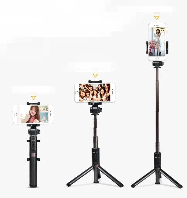 Black aluminium alloy Bluetooth selfie stick with tripod bracket extended, holding smartphone