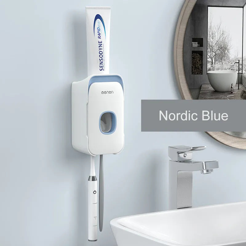 Automatic toothpaste dispenser in blue colour mounted on bathroom wall