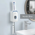 Automatic toothpaste dispenser in blue colour mounted on bathroom wall