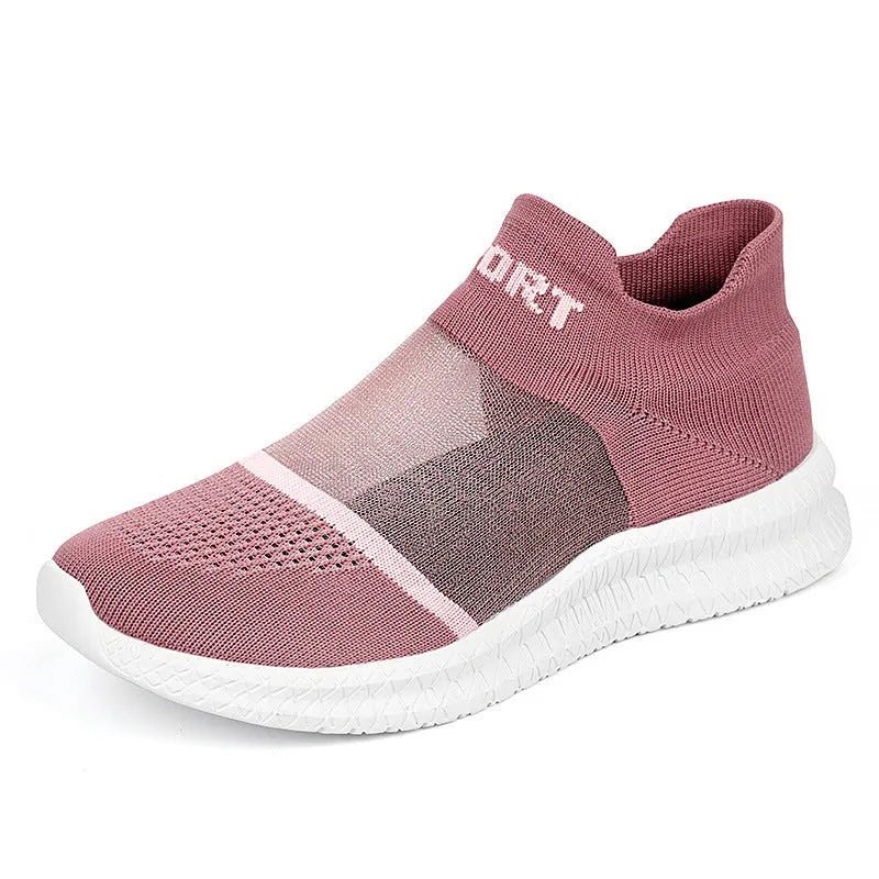 Casual beige Flyknit sports socks shoes with lace-up front and round toe on a neutral background.