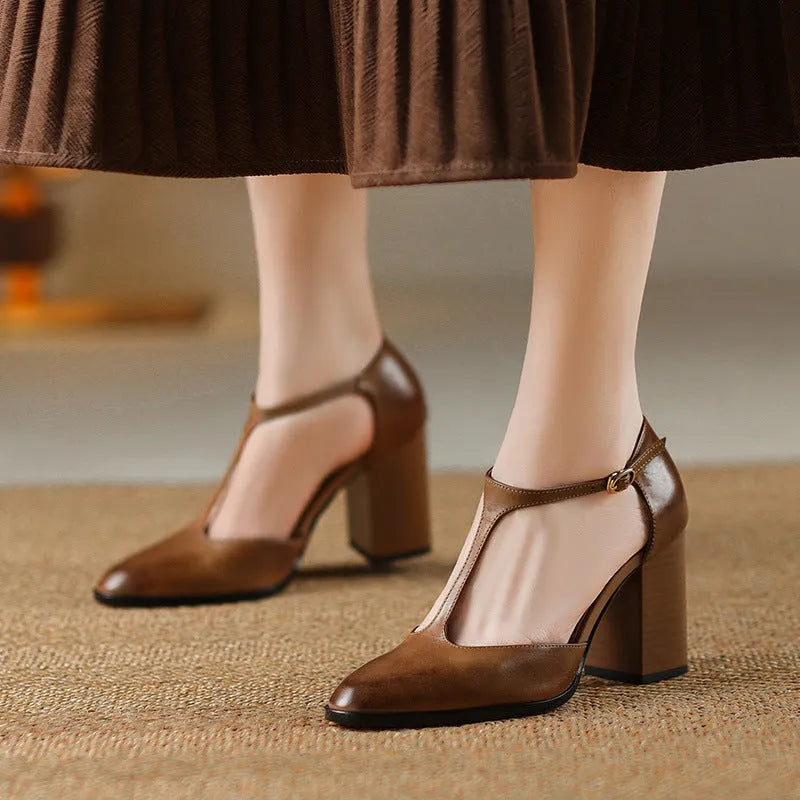 Baotou hollow women's retro pointed Mary Jane shoes in pink and dark brown with buckle fastening.