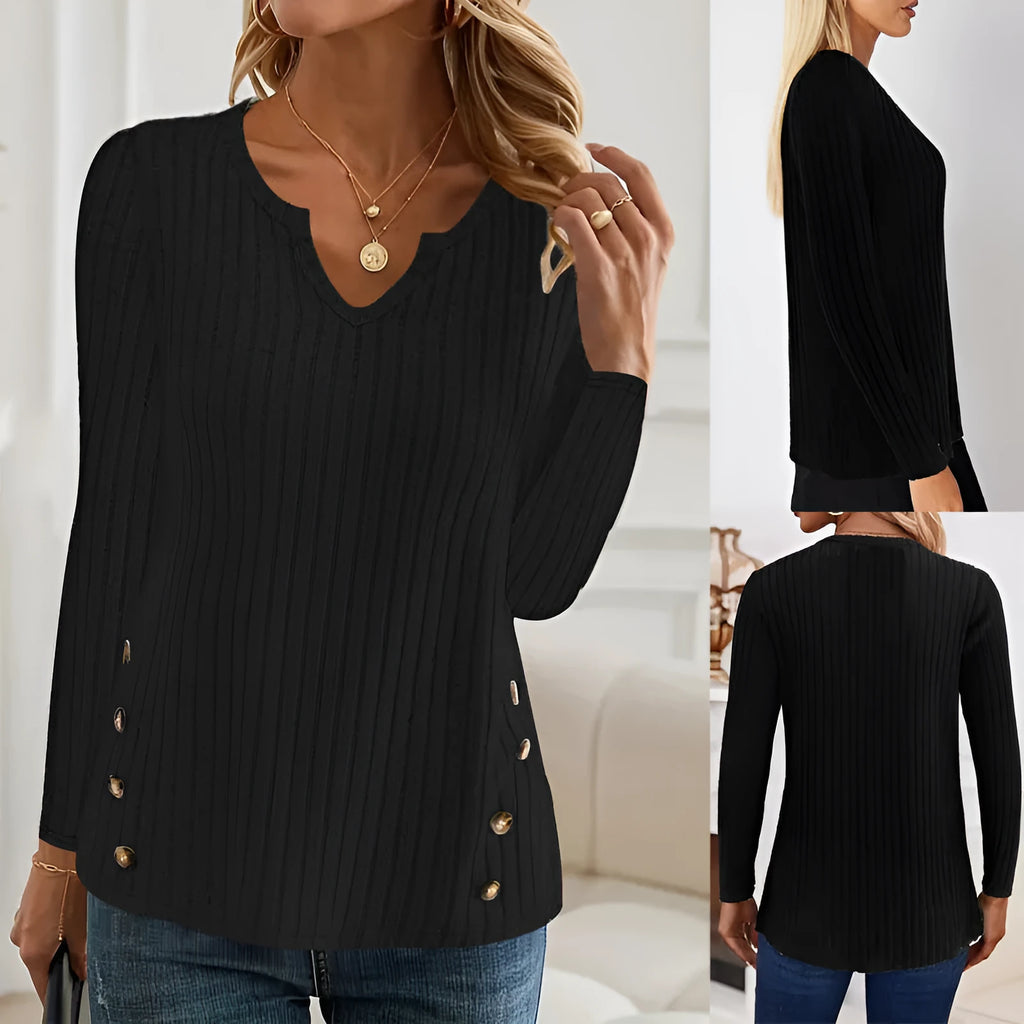 Solid colour casual knitted pullover sweater with a button detail on a hanger.