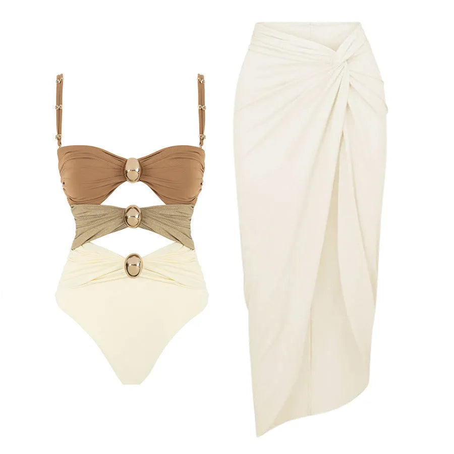 Women's solid colour one-piece swimsuit with gold buttons and detachable matching skirt