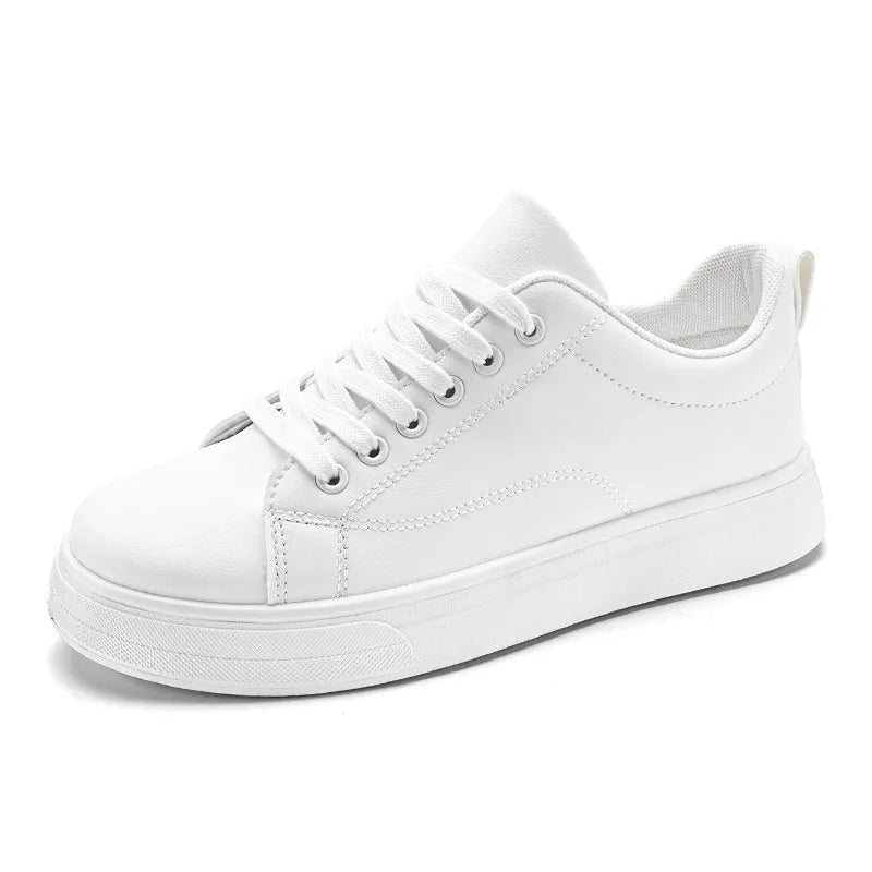 Men's low-top Korean-style sneakers in white, black, and black with white sole colours on a plain background.