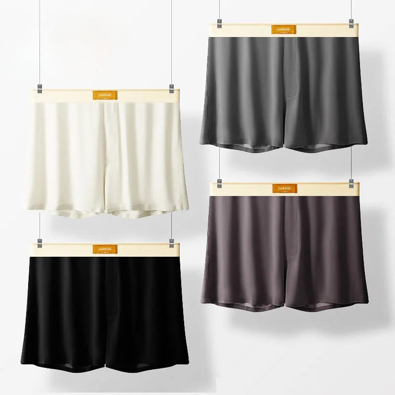 A pack of three pairs of solid colour men's ice silk loose fit boxer shorts.