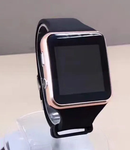 Black smart watch with 1.54 inch touch screen and silicone strap on a wrist.