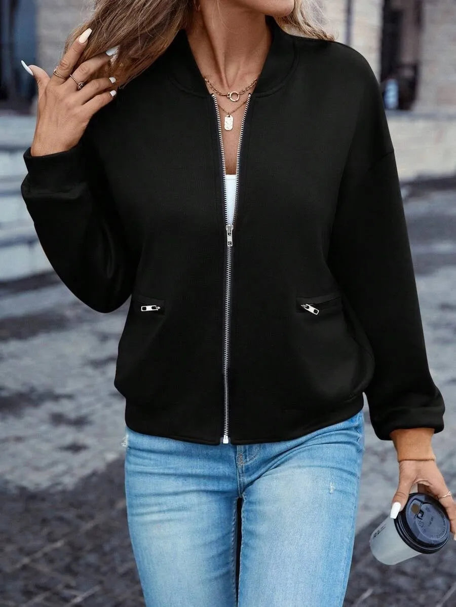 Black women's casual zip-up jacket with long sleeves and faux pockets on the front.