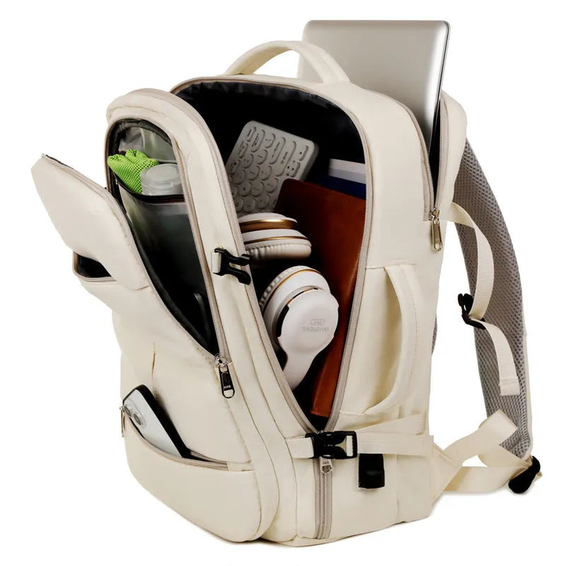 Waterproof Oxford cloth backpack with multiple pockets, shown in black colour, displaying laptop compartment and zippered organisers.
