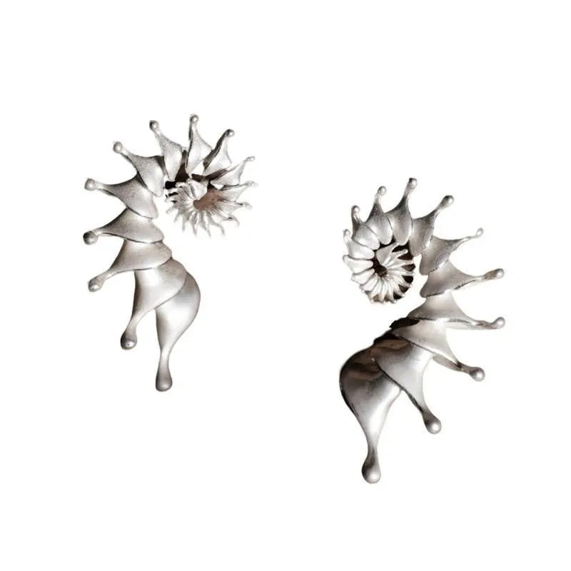Three-dimensional matte finish conch shell stud earrings with exaggerated design and irregular patterning