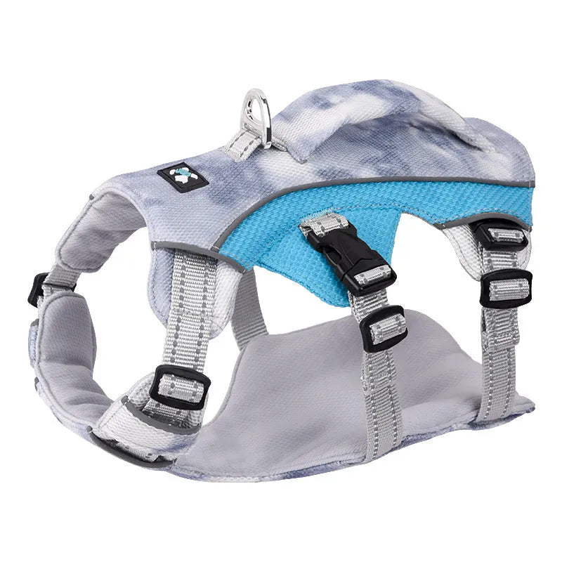 Reflective light blue dog cooling vest with chest strap on a medium-sized dog
