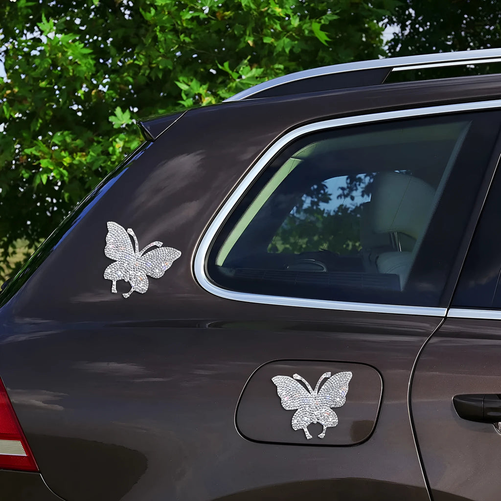 Glass diamond car sticker showing butterfly or bear paw design measuring 7x6cm