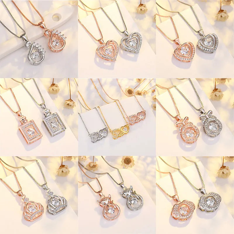 Silver heart-shaped necklace with crown and bow pendant on 45cm chain
