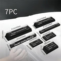 Seven frosted black EVA building blocks with metal construction for architectural modelling