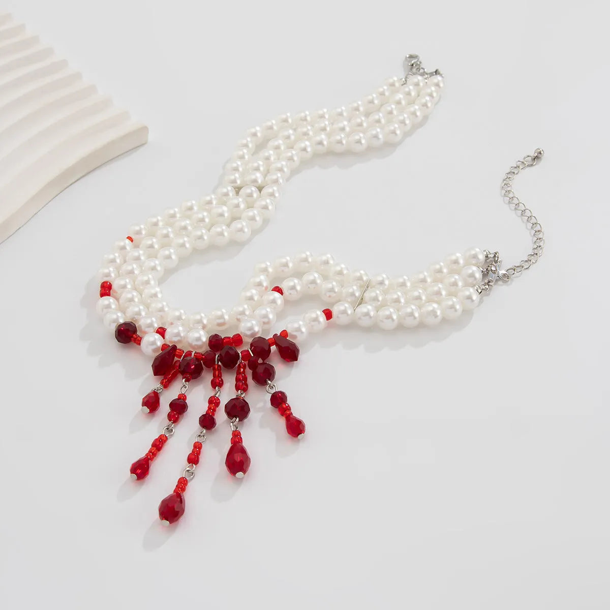 Men's Halloween necklace with blood drop crystal pendant and pearl tassel chain in red and black colours