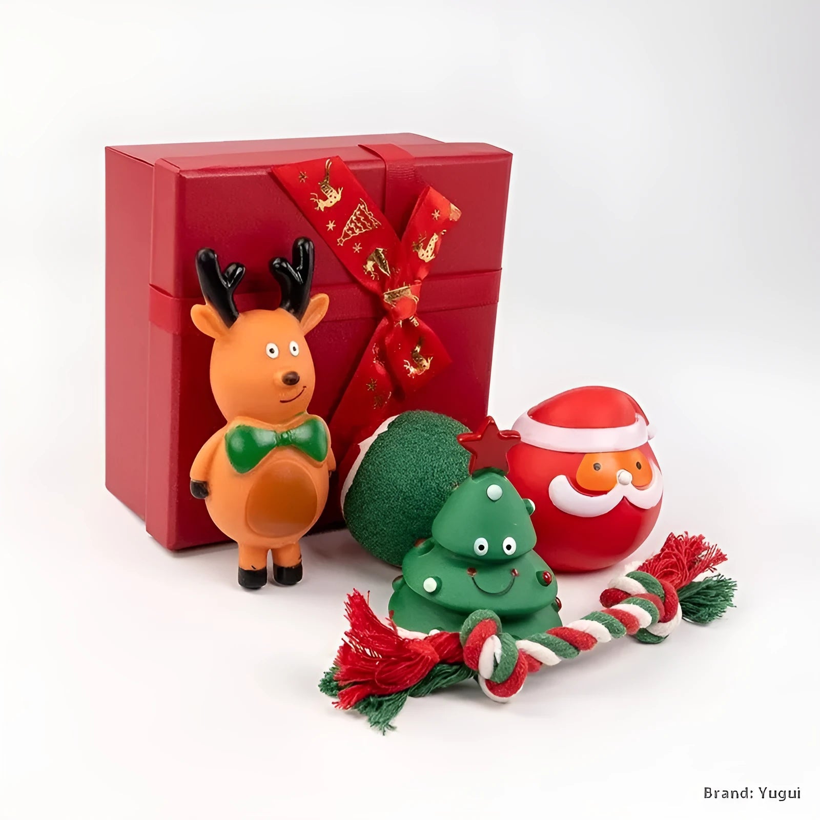 Set of vinyl Christmas-themed dog chew toys including balls, ropes, and Santa shapes in a gift bag.