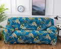 Printed geometric abstract stretch sofa slipcover fitted on a double-seater sofa.