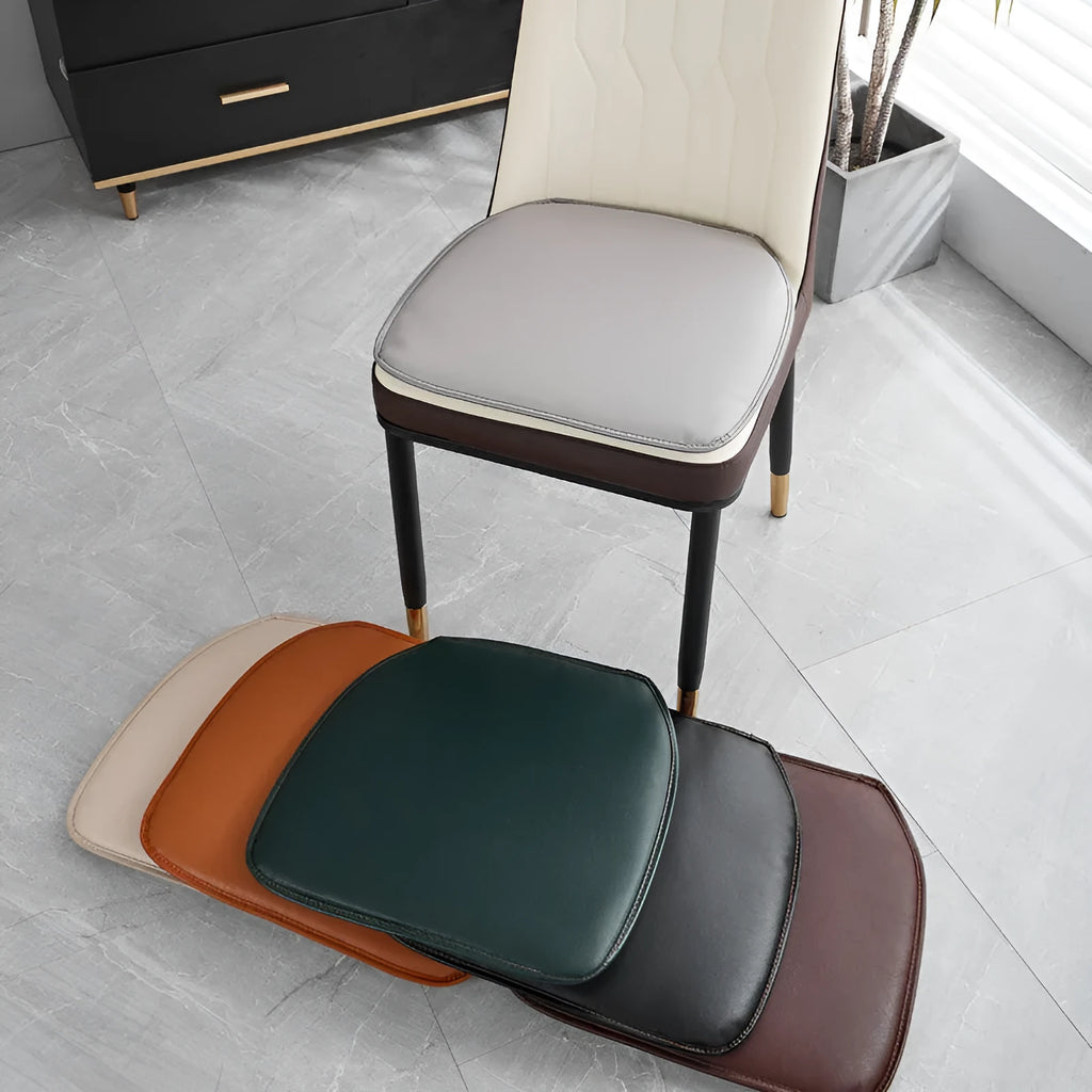 Leather horseshoe-shaped seat cushion in beige colour showing 2.5cm thickness.