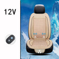 Square black car seat cushion with ventilation and massage functions on a car seat.
