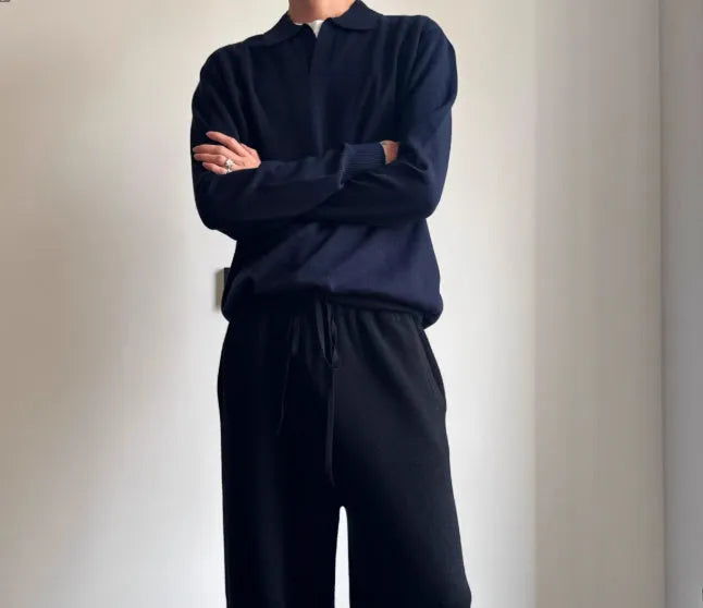 Pure wool polo neck sweater with lapel collar in loose fit, shown in milky white.