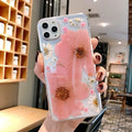 Floral TPU phone case with large pink or yellow flower designs for iPhone models