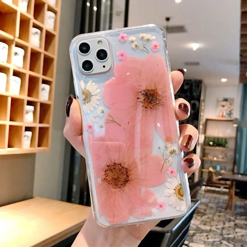 Floral TPU phone case with large pink or yellow flower designs for iPhone models