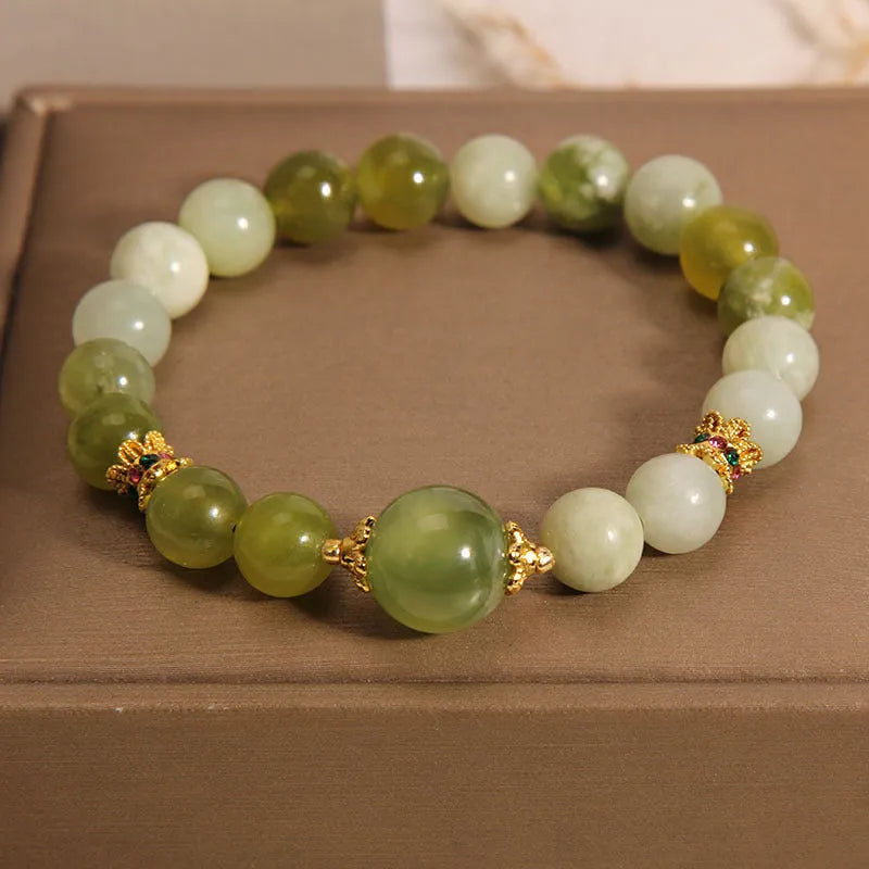 Women's bracelet made from green Xiuyan jade in a light luxury sweet Mori style.