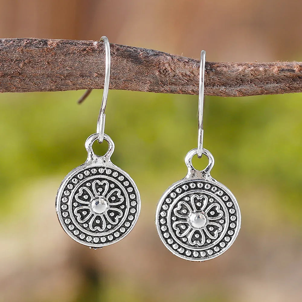 Bohemian retro geometric earrings with distressed ethnic detailing and round print design in zinc alloy