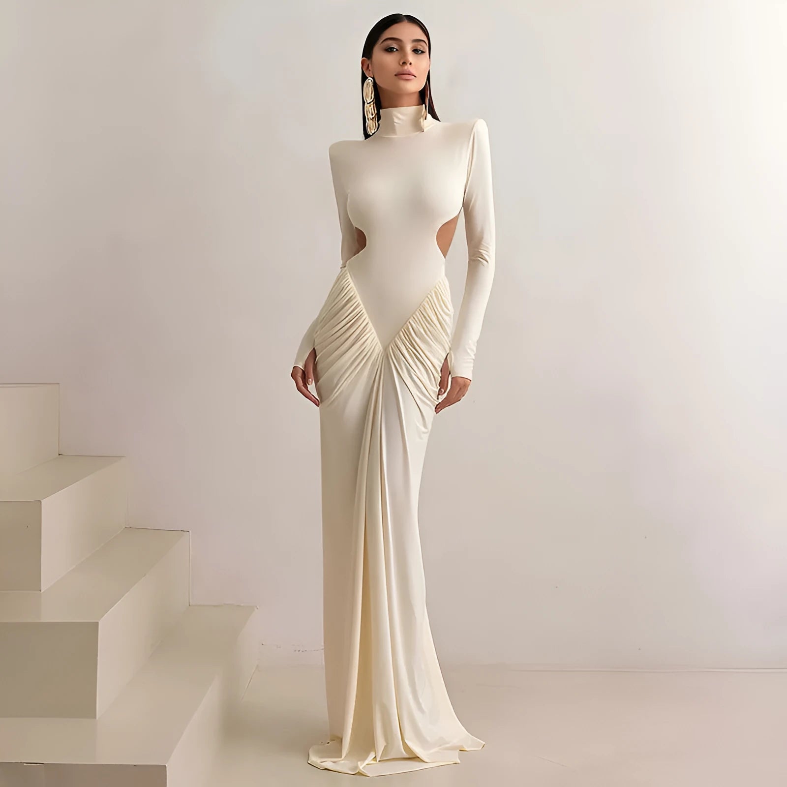 Women's slim fit long sleeve dress with high collar and pleated backless detail in a solid colour.