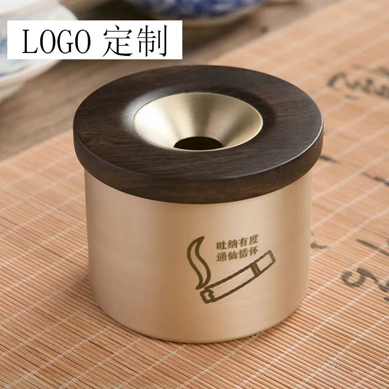 Brass retro ashtray with a wooden lid, available in black or rosewood finish.