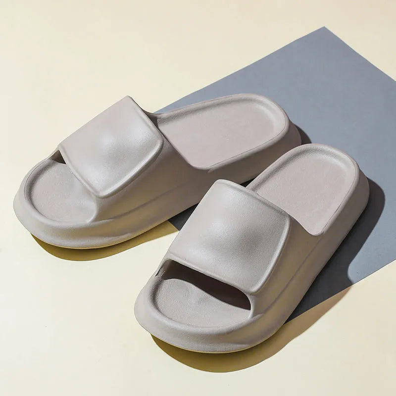 Soft EVA flip-flop slippers with a thick sole, shown in multiple colours including black, pink, and grey.