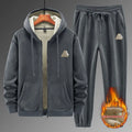 Grey men's cashmere hooded sweater and matching cotton trousers casual sports suit set on a hanger.