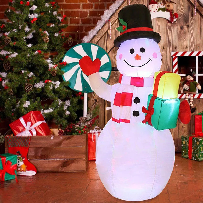 Christmas LED inflatable decoration of a glowing Santa Claus figure in a garden at night