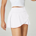 Women's solid colour quick-drying sports shorts in light blue on a mannequin, showing waist-length pullover design.