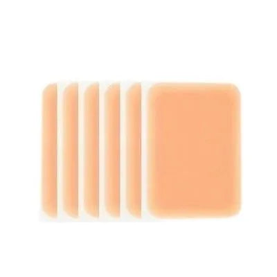 Adhesive tattoo cover patch and 130mm long applicator brush for skin concealment makeup.