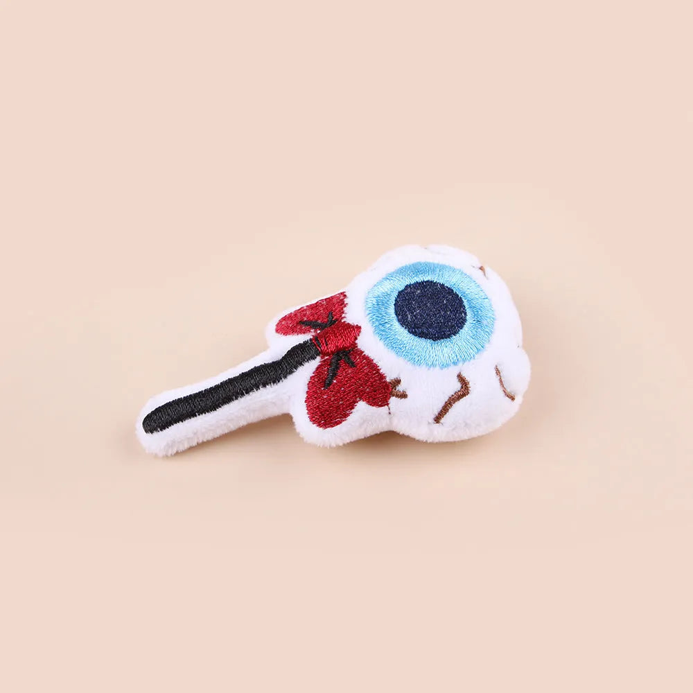 Small plush cat teaser wand with candy character design on flexible string