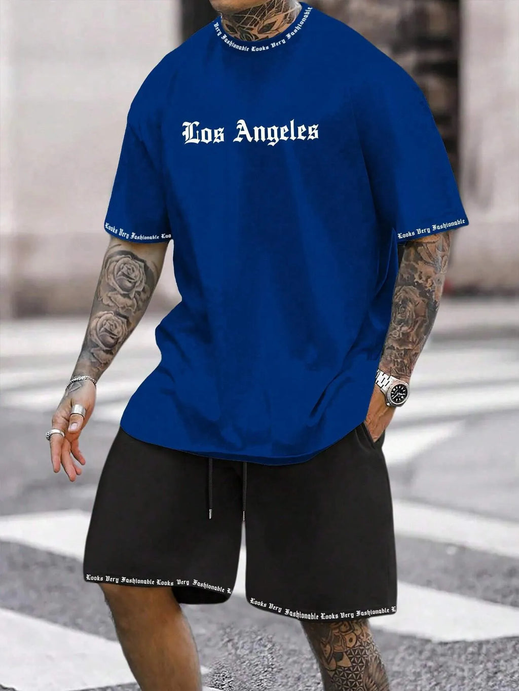 Sports style short-sleeved top and matching shorts set in solid colour on hanger