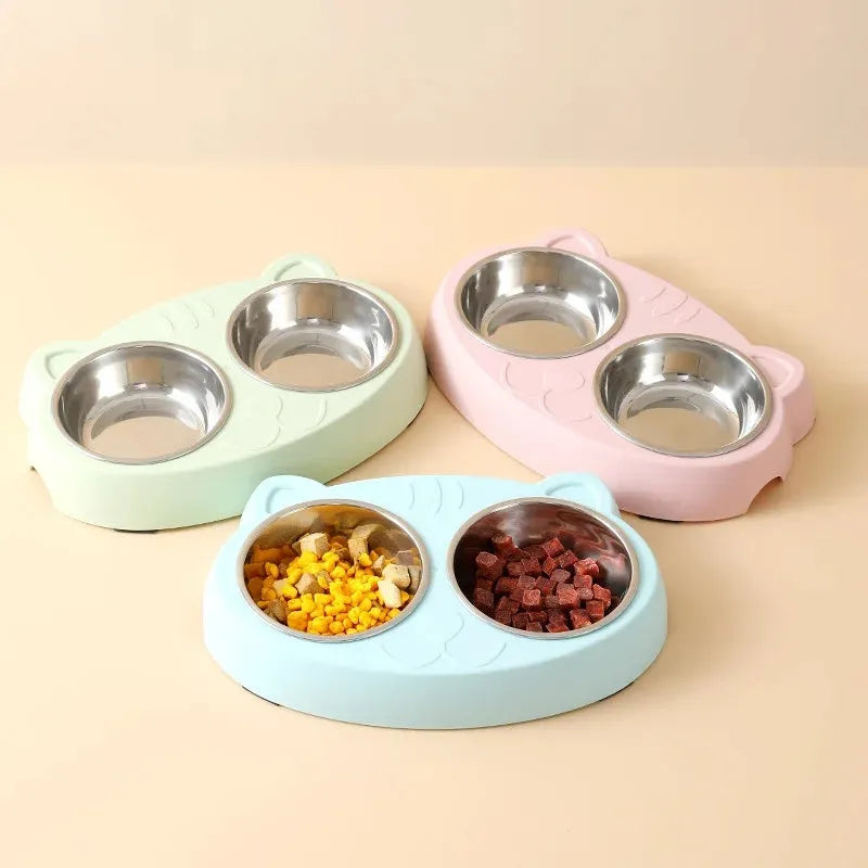 Blue macaron-shaped plastic pet feeding tray with two bowls and non-slip rubber feet