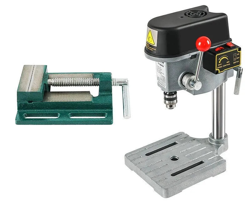 Mini bench drill and milling machine on a workbench with cross bench pliers and heavy duty pliers