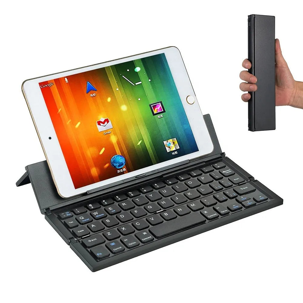 Black mini folding Bluetooth keyboard shown open next to a tablet, displaying its compact 5.8-inch size and aluminium bottom.