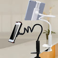Black flexible mount holder with bendy arm and suction cup holding a mobile phone at an angle.