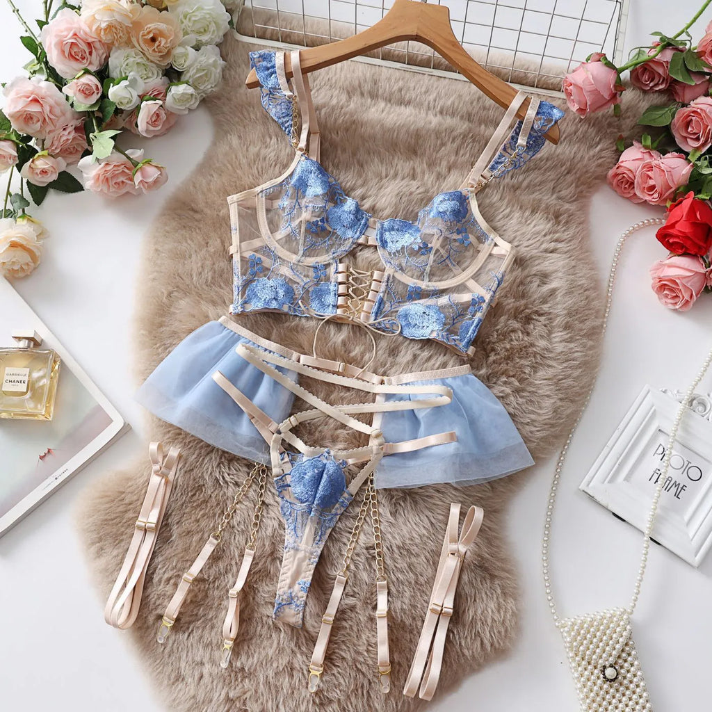 Light blue embroidered lace push up bra and matching briefs set with transparent mesh detail.
