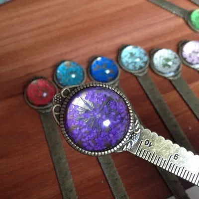 Handmade dried gypsophila flower bookmark ruler showing lace flowers, daffodils, and clovers on 12cm length
