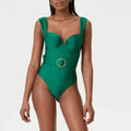 Women's one-piece swimsuit with a flowing gauze skirt, shown in a sleeveless design.