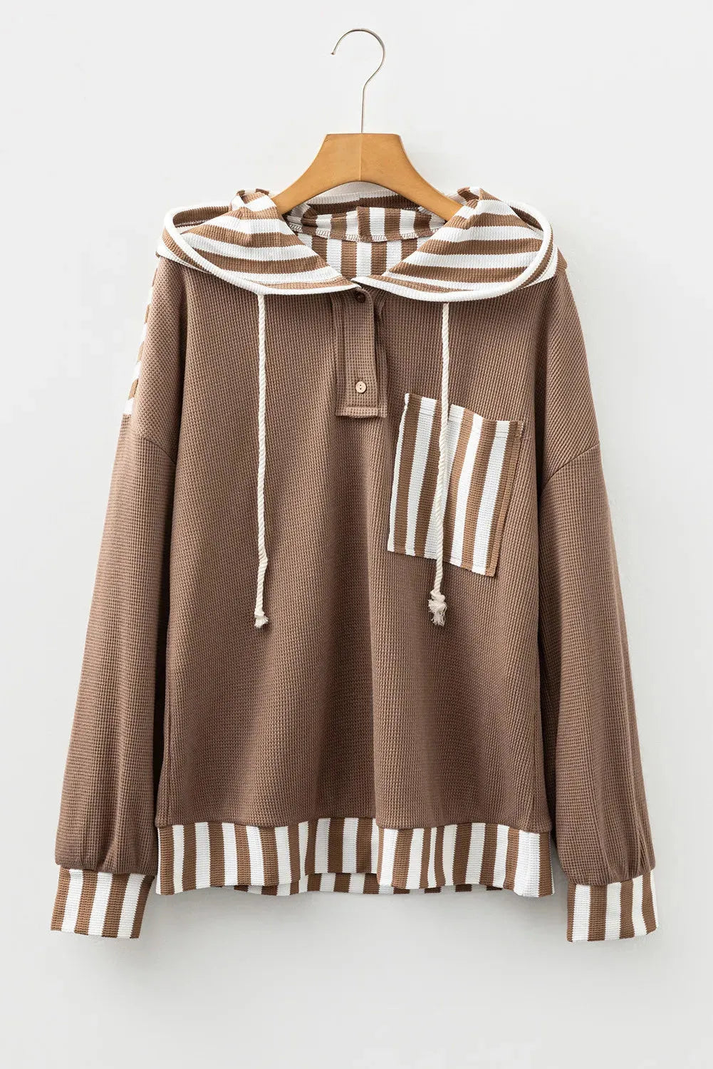 Straw yellow waffle texture hoodie with striped patchwork, button neck, and drawstring hood.