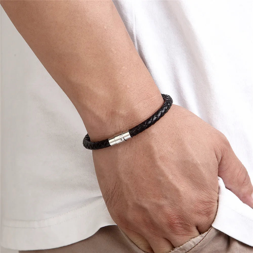 Titanium steel geometric wire bracelet with a magnetic clasp shown on a wrist.