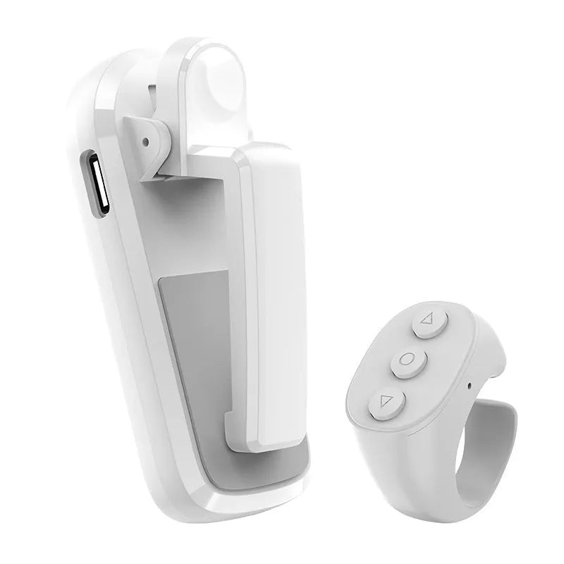 Wireless page turner remote control with clicker for e-readers and tablets in black, white, or pink colours.