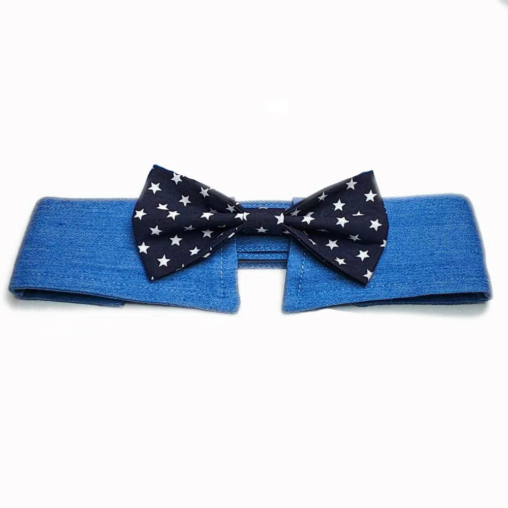 Denim dog collar with an attached red star pattern necktie, showing the adjustable fastener tape closure.