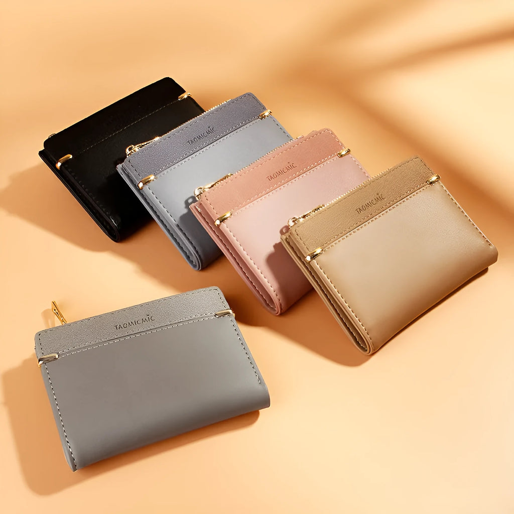 Ladies wallet with zipper closure showing multiple card slots and compartments in PU leather