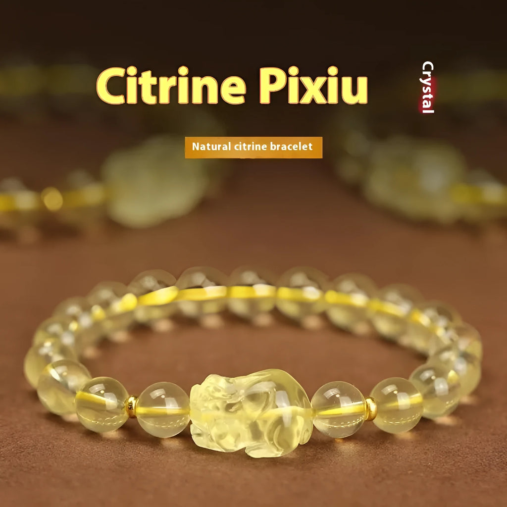 Yellow leather Citrine Pi Xiu bracelet with a clear artificial crystal charm in Chinese simple style.
